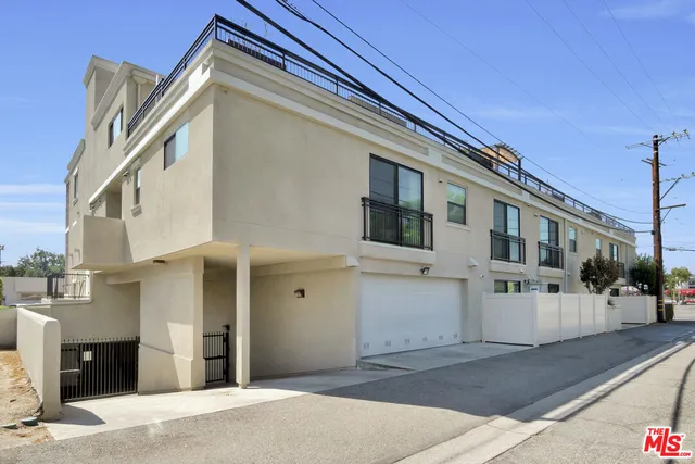 a view of a building with a street