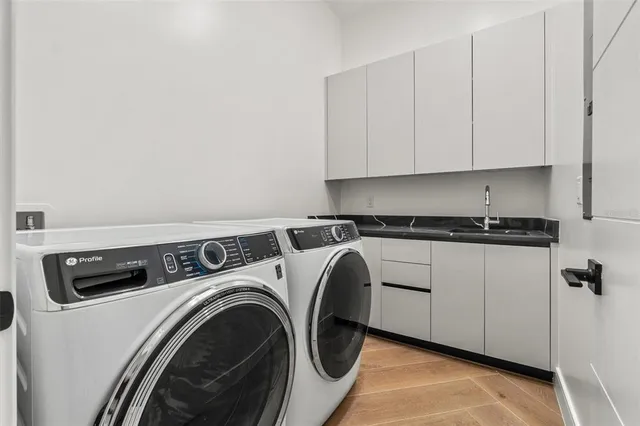 a utility room with dryer and washer