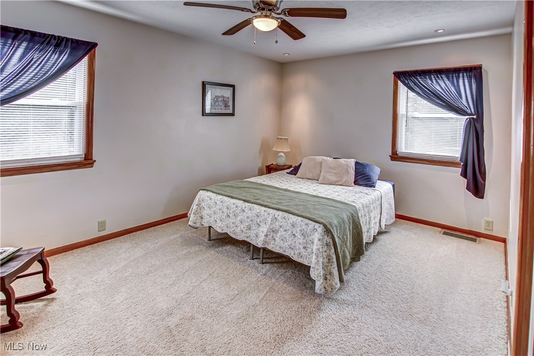 4234 Grafton Road Brunswick, OH 44212 - Photo 17 of 40 Carpeted bedroom featuring ceiling fan