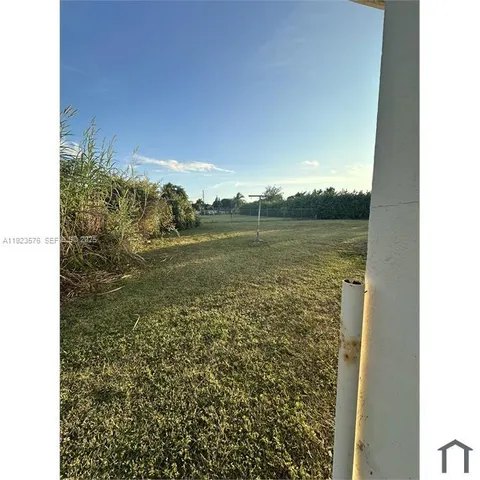 a view of a lake from a balcony