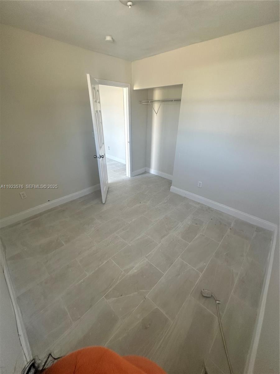 11800 Southwest 212th Street, Unit 11800 Miami, FL 33177 - Photo 10 of 14 a view of an empty room