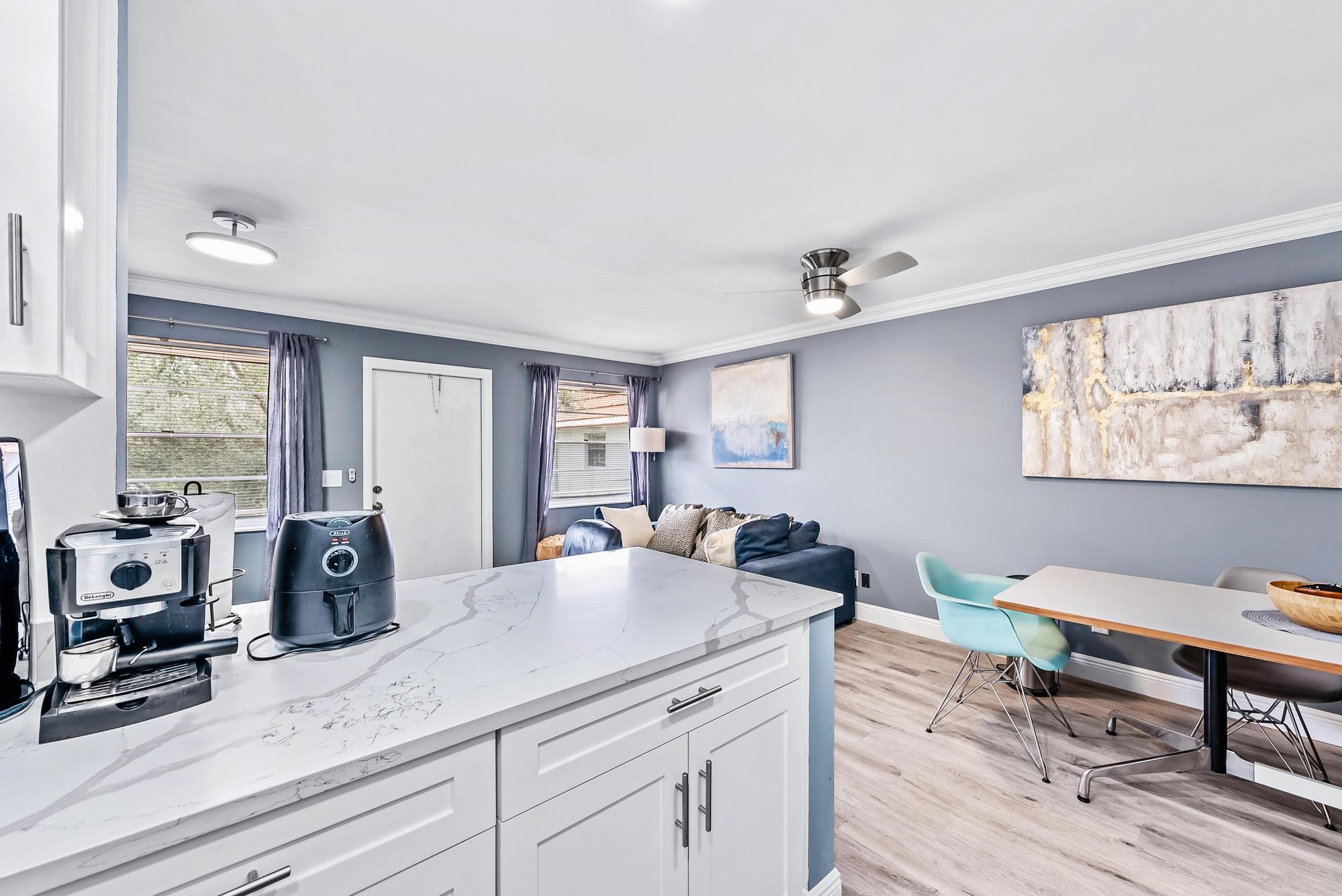 2600 Southeast Ocean Boulevard, Unit A11 Stuart, FL 34996 - Photo 6 of 12 a view of living room with furniture and wooden floor