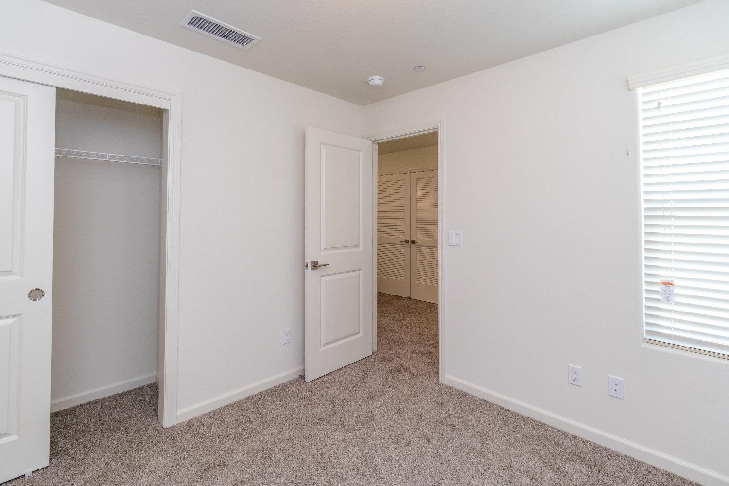 512 Pioneer Lane Clovis, CA 93619 - Photo 12 of 17 a view of an empty room