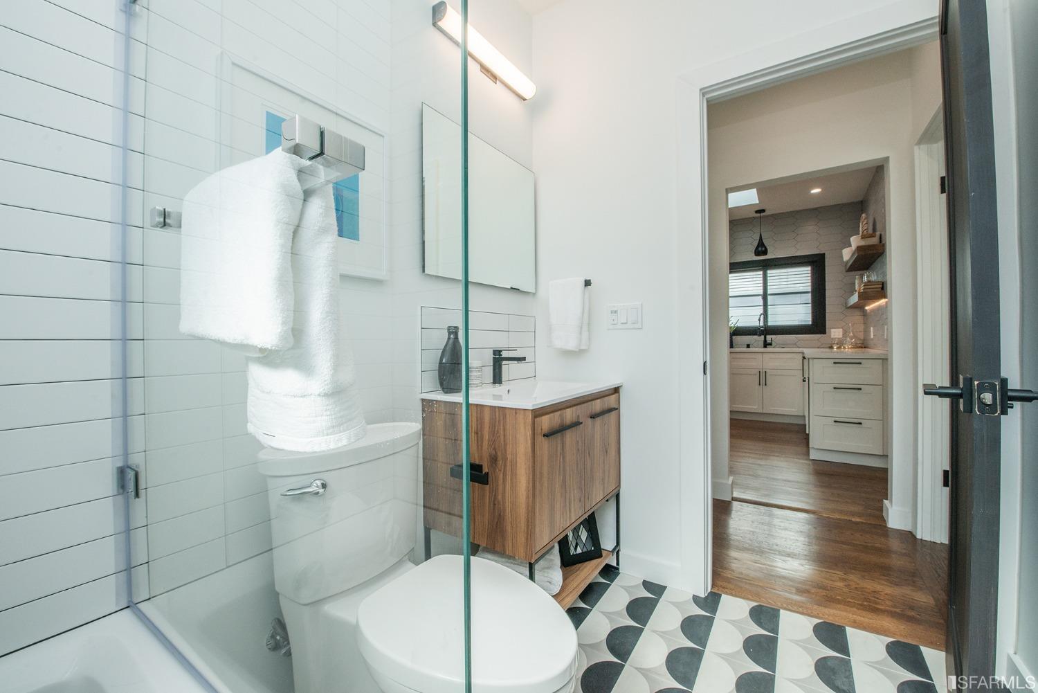 2422 Bonar Street Berkeley, CA 94702 - Photo 13 of 54 a bathroom with a sink toilet and shower