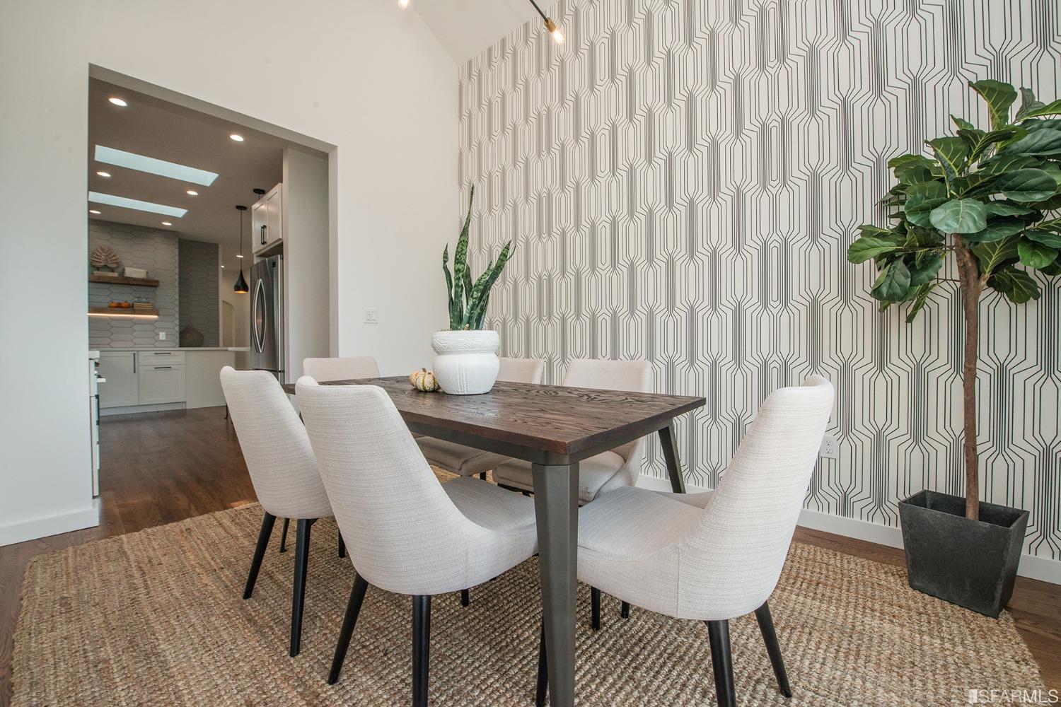 2422 Bonar Street Berkeley, CA 94702 - Photo 19 of 54 a view of a dining room with furniture and wooden floor