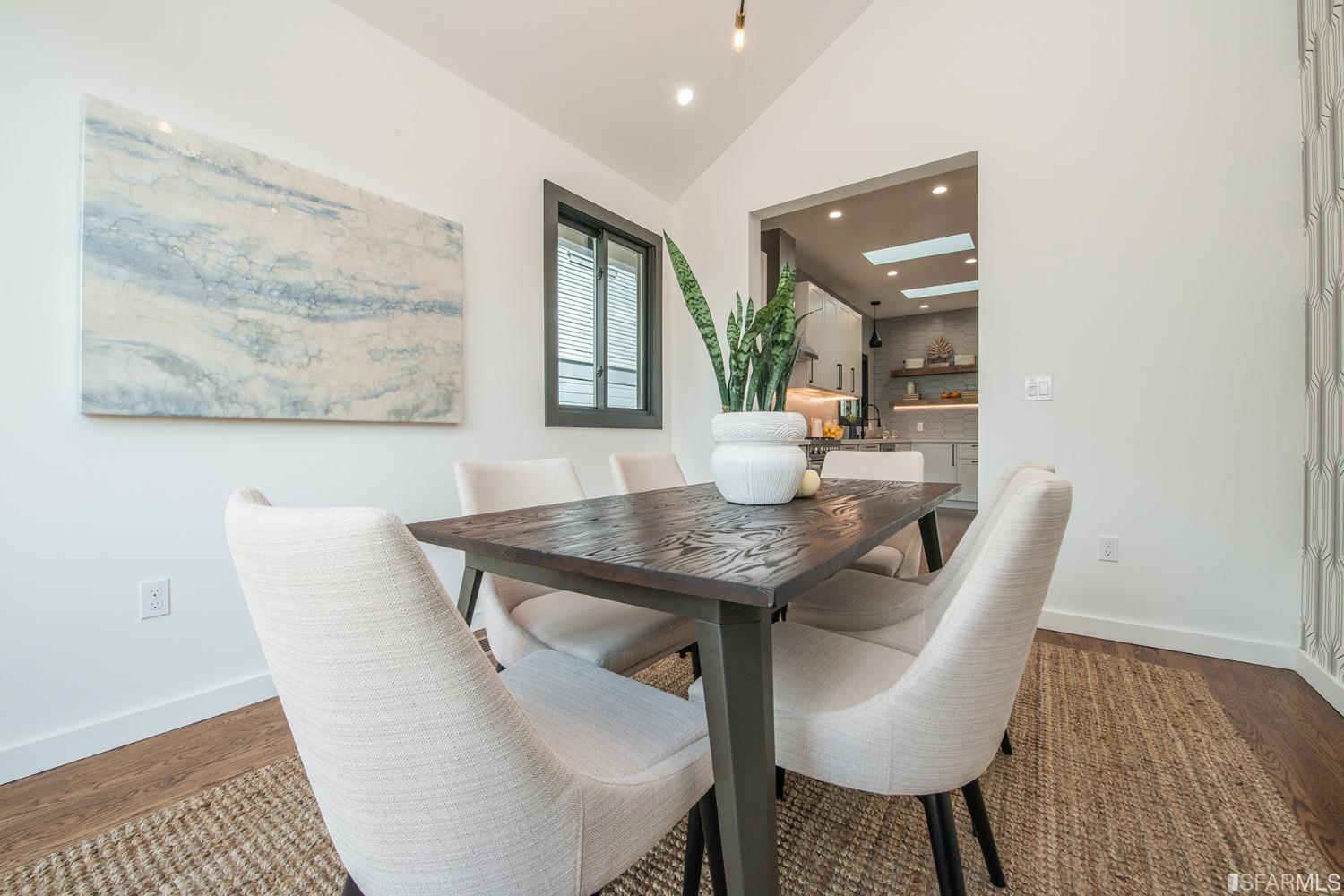 2422 Bonar Street Berkeley, CA 94702 - Photo 20 of 54 a view of a dining room with furniture and wooden floor