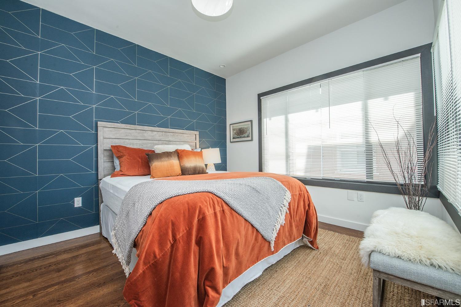 2422 Bonar Street Berkeley, CA 94702 - Photo 21 of 54 a bedroom with a bed and window