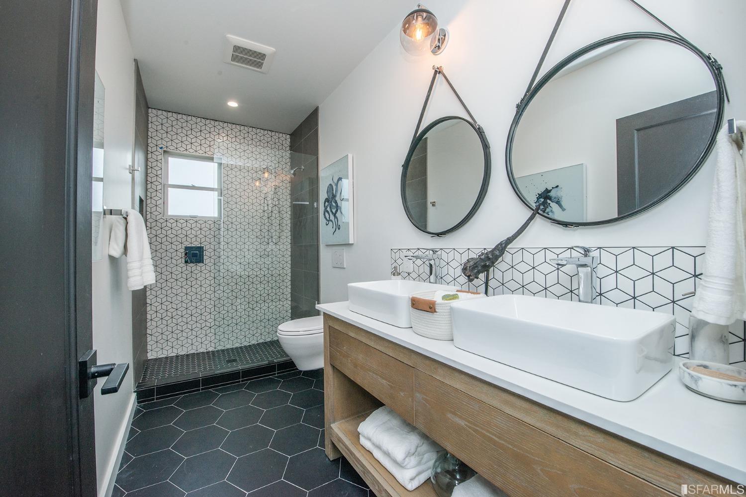 2422 Bonar Street Berkeley, CA 94702 - Photo 23 of 54 a bathroom with a sink and a mirror