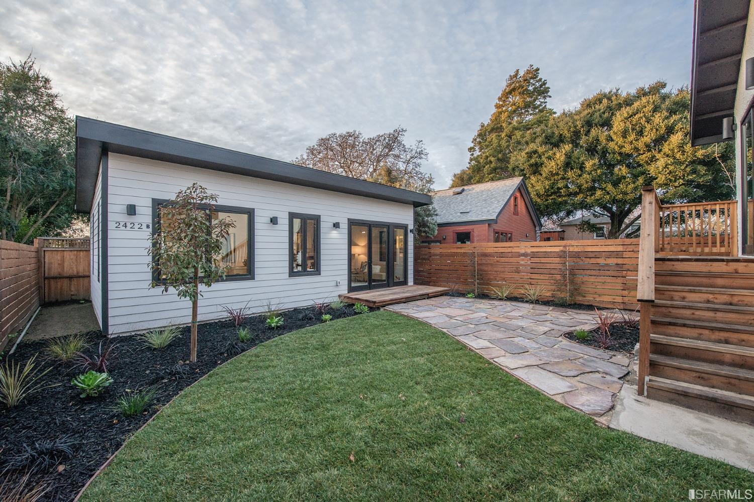 2422 Bonar Street Berkeley, CA 94702 - Photo 43 of 54 a front view of a house with a yard and an outdoor seating