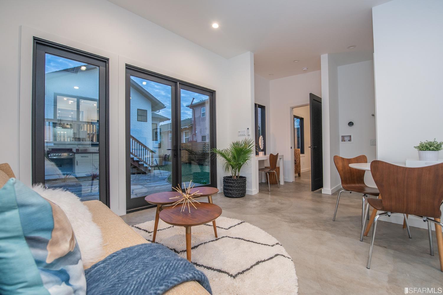 2422 Bonar Street Berkeley, CA 94702 - Photo 47 of 54 a living room with furniture and a potted plant