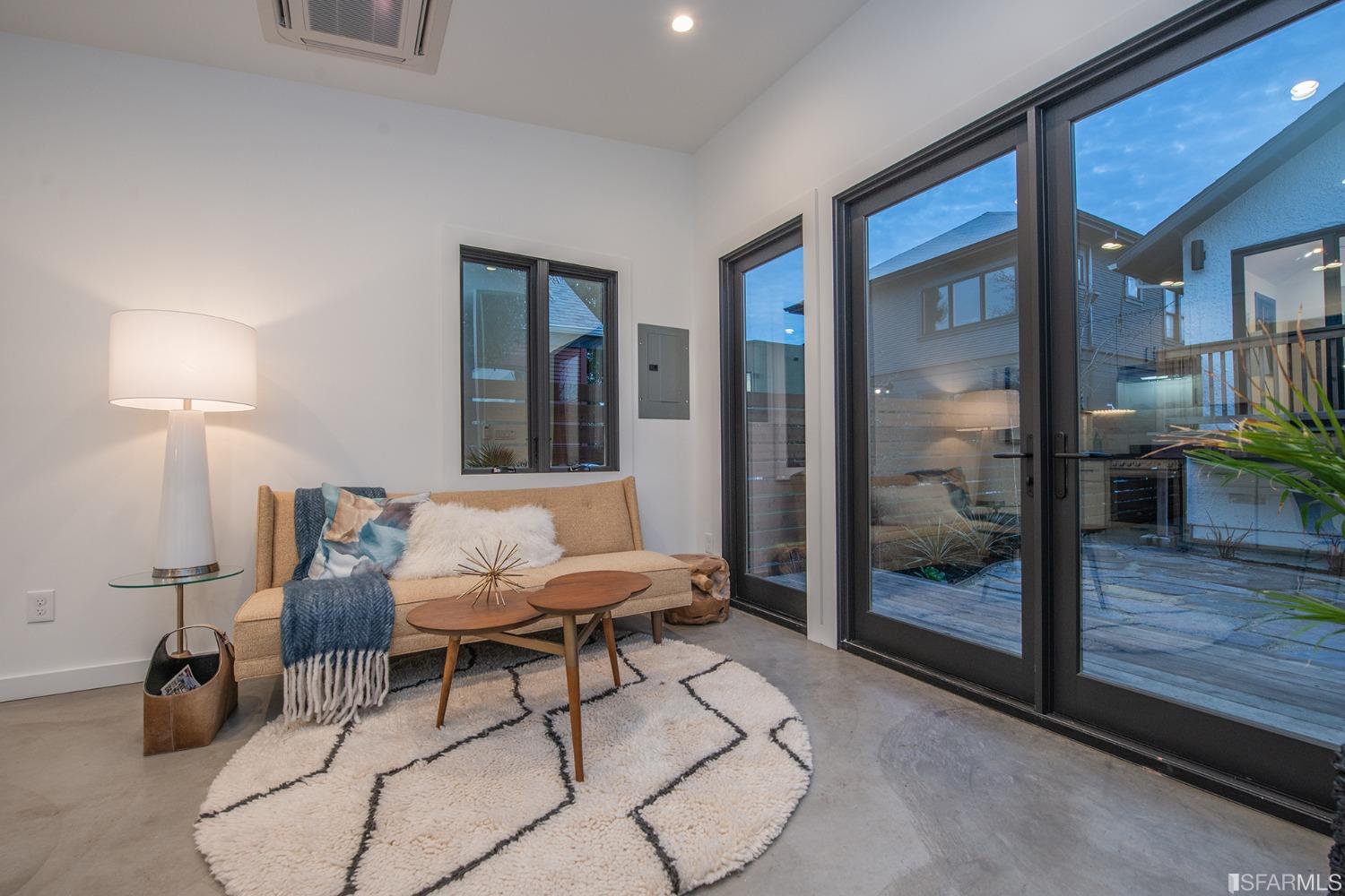 2422 Bonar Street Berkeley, CA 94702 - Photo 48 of 54 a living room with furniture and a gate
