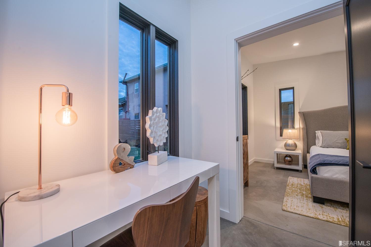 2422 Bonar Street Berkeley, CA 94702 - Photo 51 of 54 a en suite bathroom with a double vanity sink and a mirror