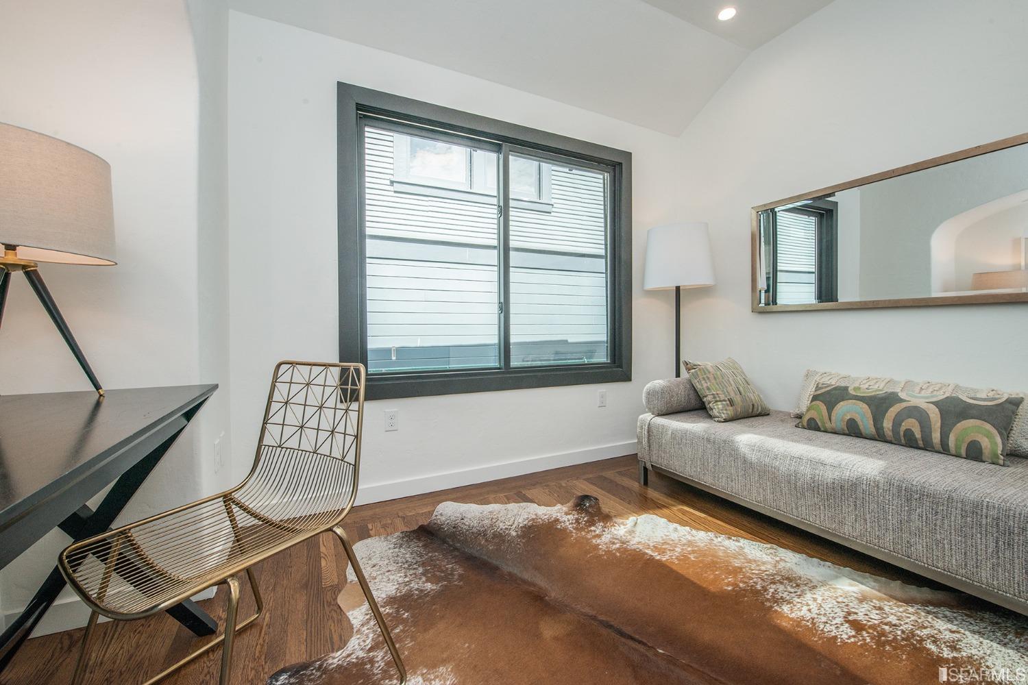 2422 Bonar Street Berkeley, CA 94702 - Photo 8 of 54 a living room with furniture and a window
