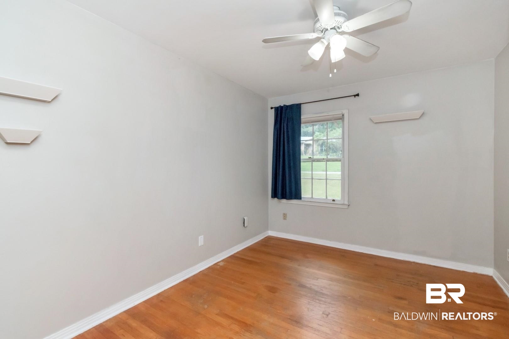 320 Vanderbilt Drive Mobile, AL 36608 - Photo 25 of 39 Spare room with ceiling fan and hardwood / wood-style flooring