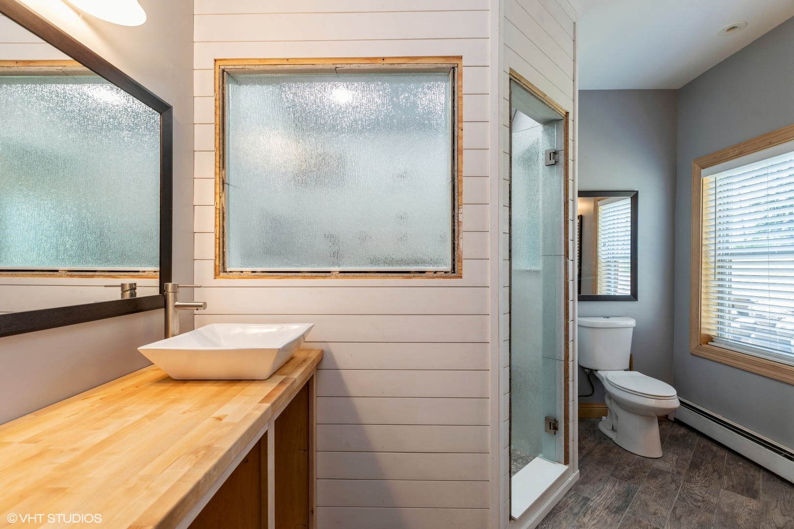 28660 Golf View Drive Spring Grove, IL 60081 - Photo 11 of 25 a bathroom with a granite countertop sink and a mirror