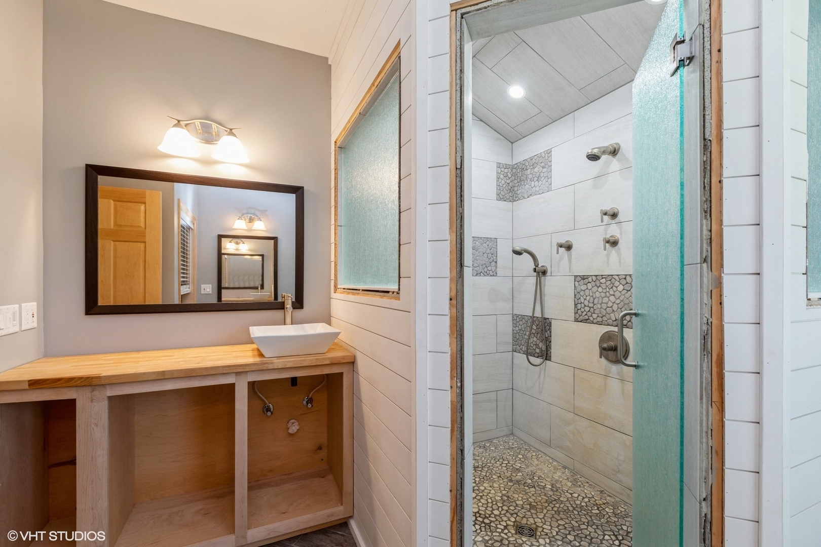 28660 Golf View Drive Spring Grove, IL 60081 - Photo 12 of 25 a bathroom with a shower sink and mirror