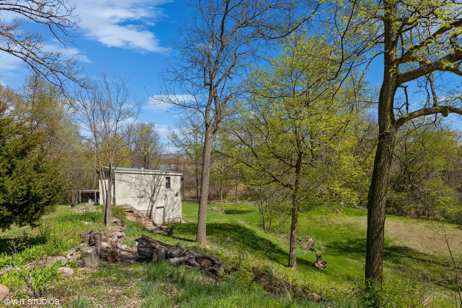 28660 Golf View Drive Spring Grove, IL 60081 - Photo 16 of 25 a backyard of a house with lots of green space