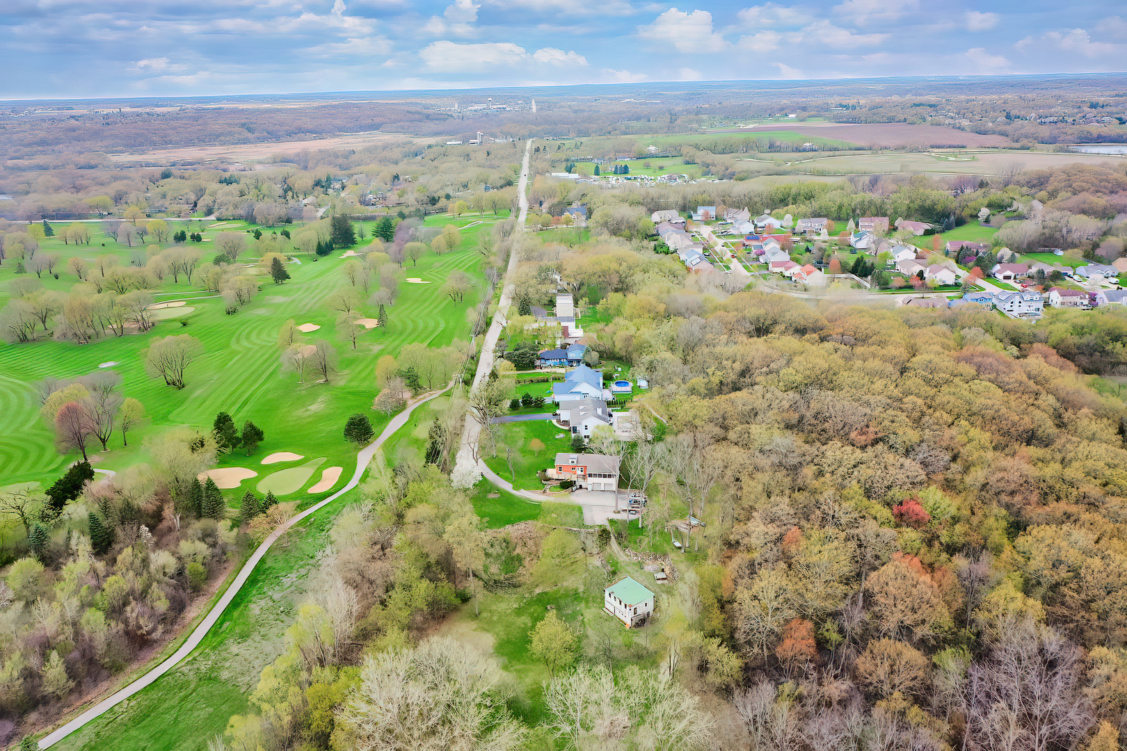 28660 Golf View Drive Spring Grove, IL 60081 - Photo 18 of 25 a view of a lake with a mountain in the background