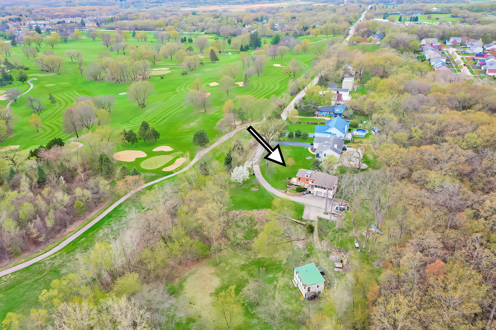 28660 Golf View Drive Spring Grove, IL 60081 - Photo 2 of 25 a backyard of a house with lots of green space