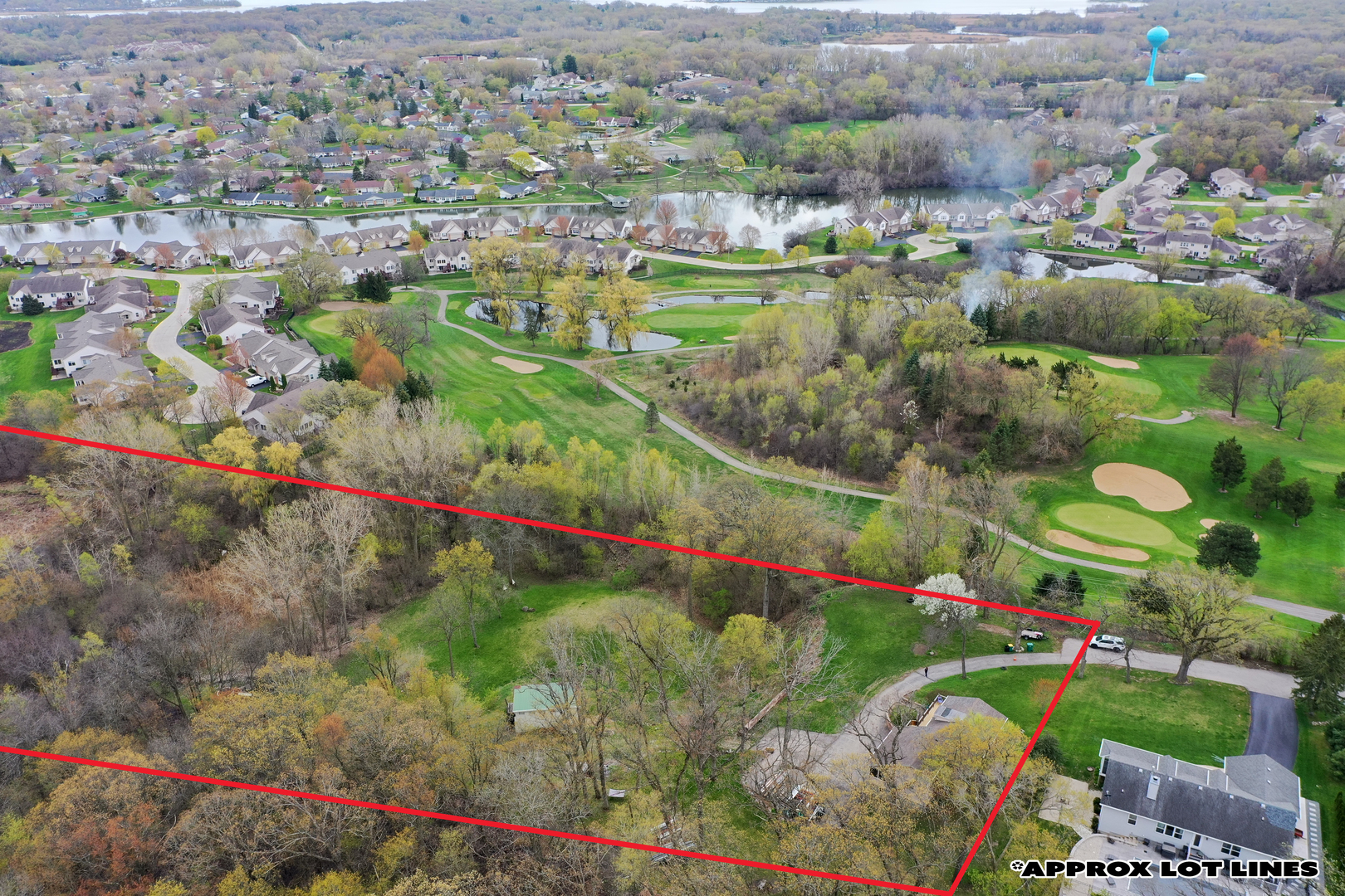 28660 Golf View Drive Spring Grove, IL 60081 - Photo 21 of 25 an aerial view of lake and residential houses with outdoor space