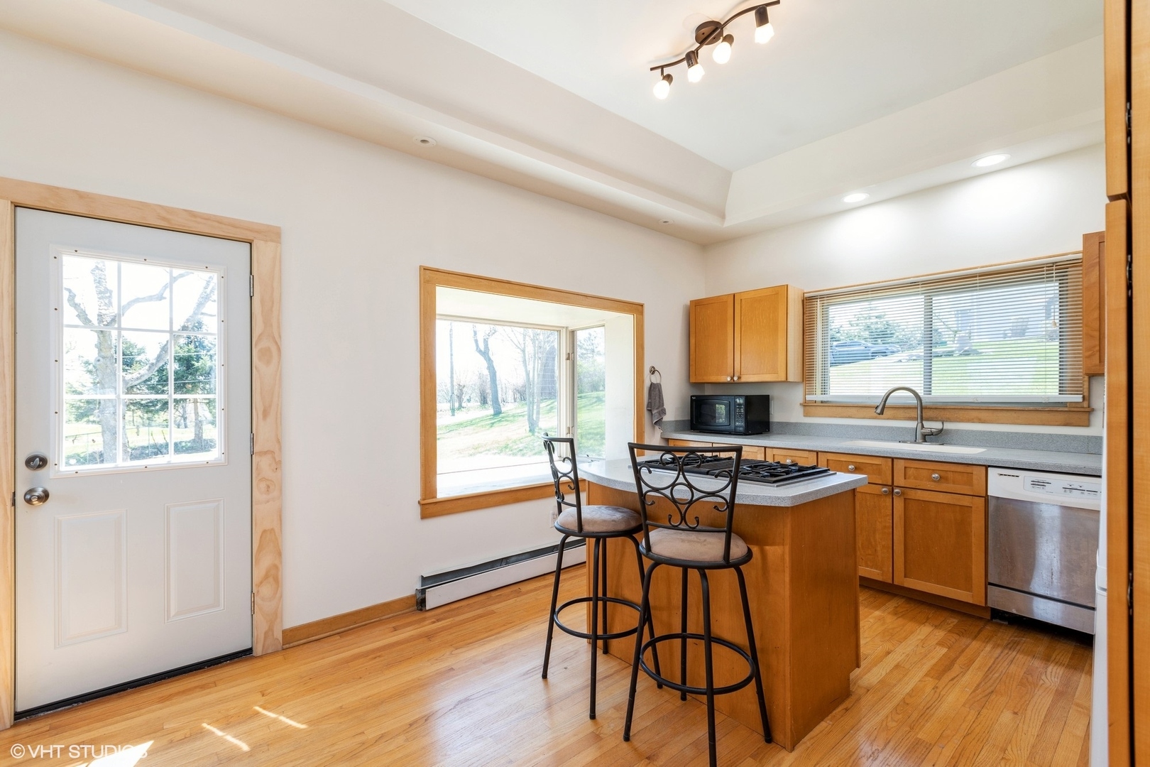 28660 Golf View Drive Spring Grove, IL 60081 - Photo 6 of 25 a view of a dining room with furniture window and wooden floor
