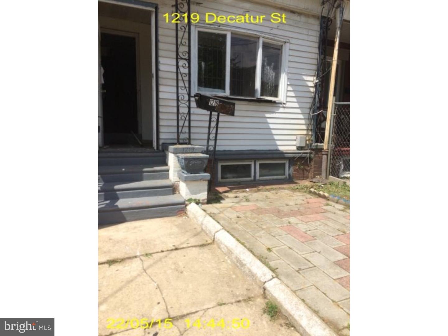 a view of house with backyard