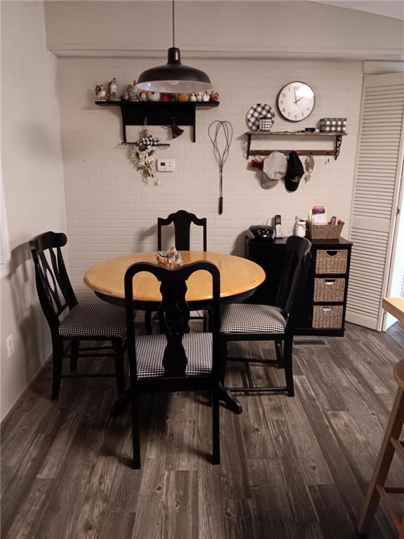 13 Black Road Northeast White, GA 30184 - Photo 15 of 31 a view of a dining room with furniture and wooden floor