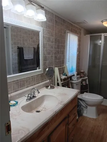 a bathroom with a sink and a toilet