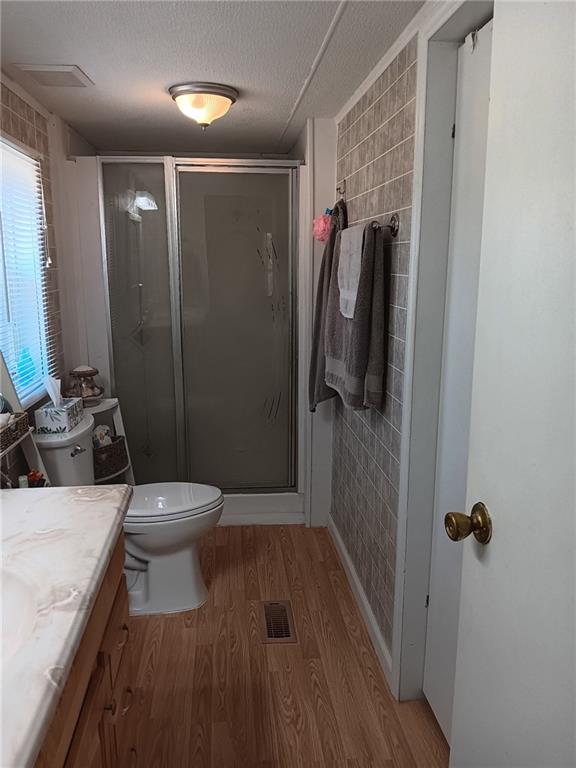 13 Black Road Northeast White, GA 30184 - Photo 23 of 31 a bathroom with a sink a toilet and shower