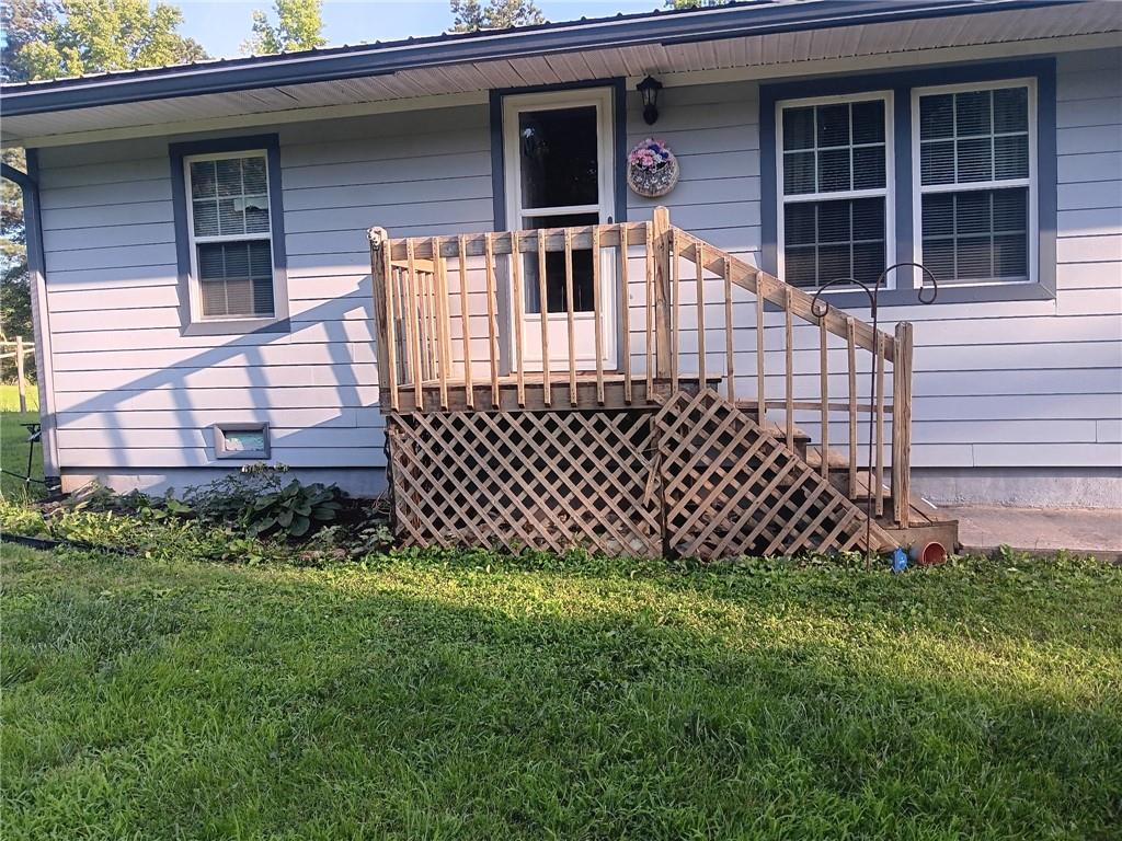 13 Black Road Northeast White, GA 30184 - Photo 3 of 31 a front view of a house with a garden