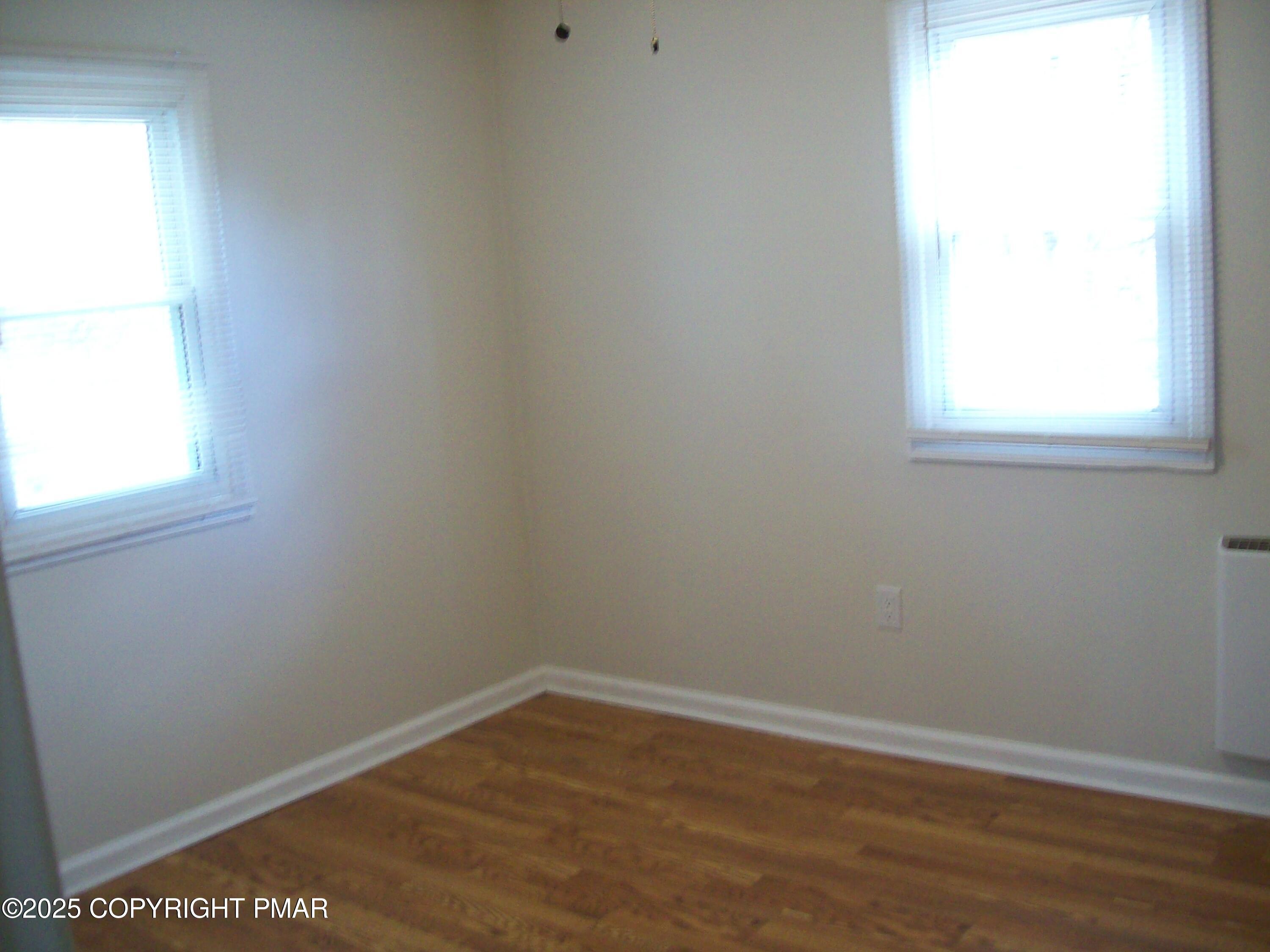 116 Kasak Road East Stroudsburg, PA 18302 - Photo 14 of 17 an empty room with a window