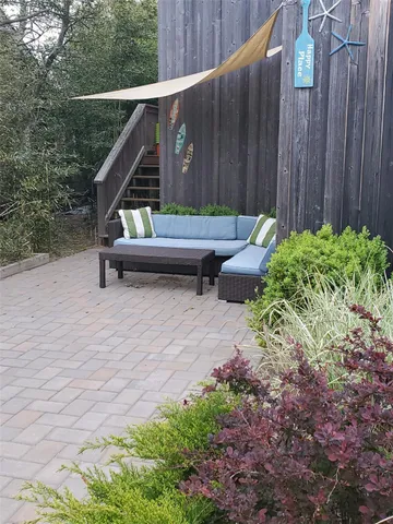 a garden view with a seating space