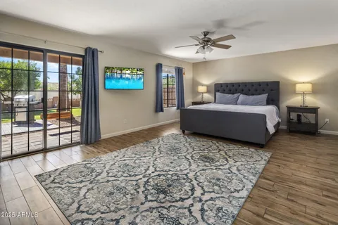 a living room with a couch and a rug