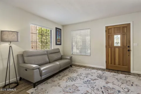 a living room with furniture and window