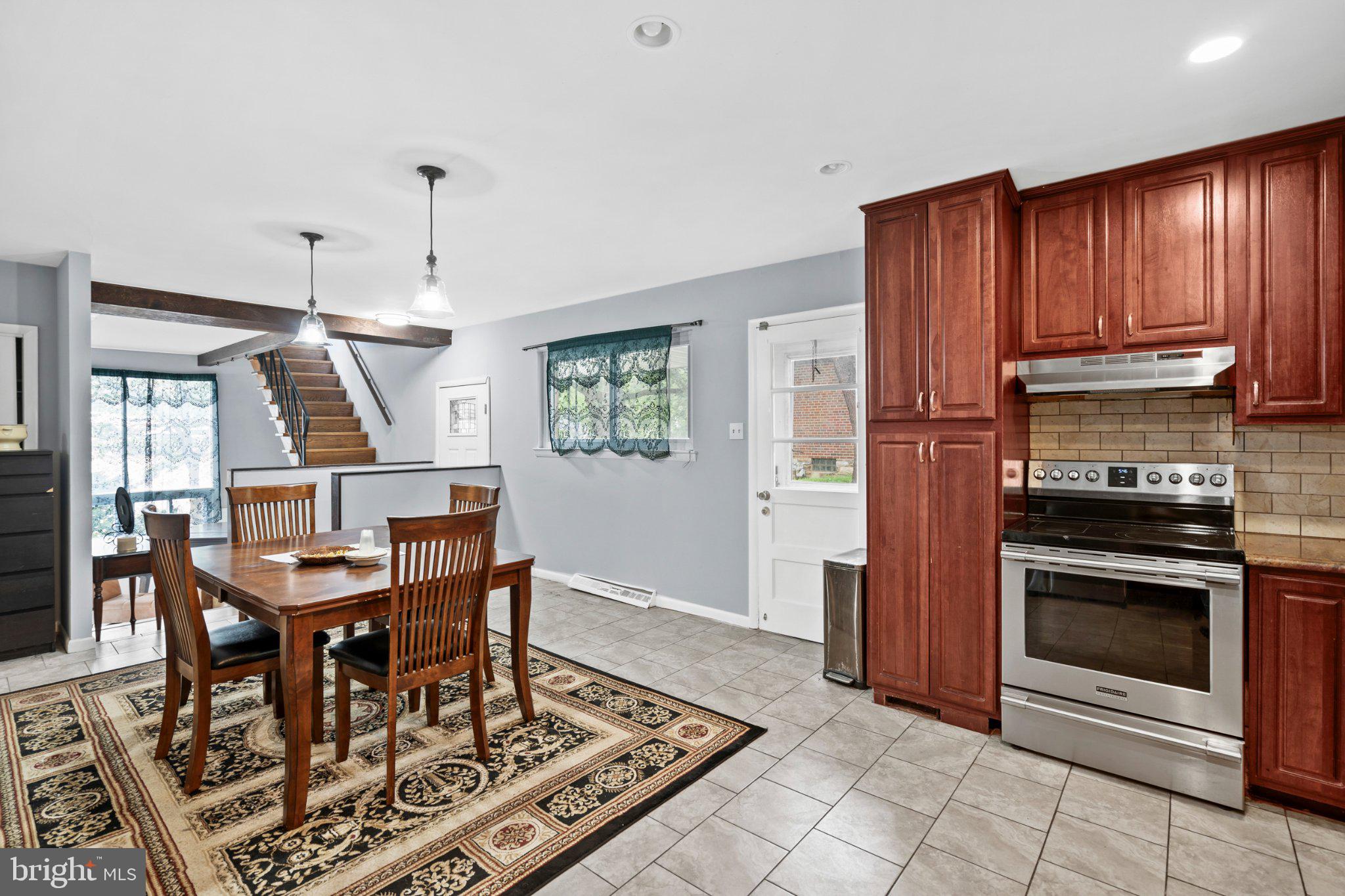 609 Foster Road Cheltenham, PA 19012 - Photo 9 of 44 Inviting kitchen with modern charm.