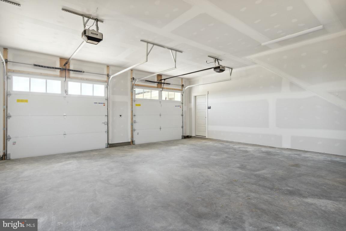 3110 Thurston Road Frederick, MD 21704 - Photo 35 of 38 Oversized garage with work space above.
