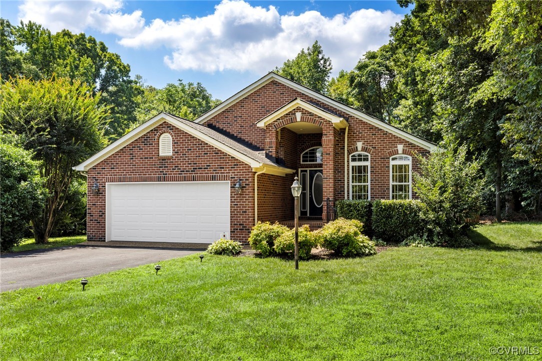 2901 Kingsdale Road North Chesterfield, VA 23237 - Photo 1 of 22 a front view of house with yard and green space