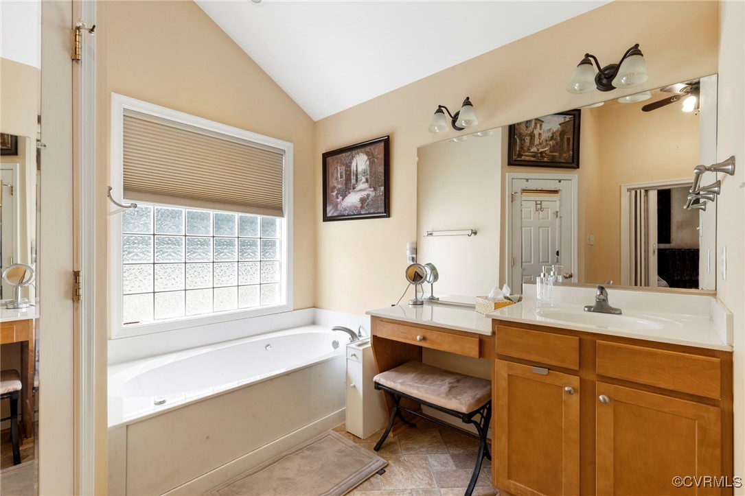 2901 Kingsdale Road North Chesterfield, VA 23237 - Photo 11 of 22 a bathroom with a tub sink and mirror