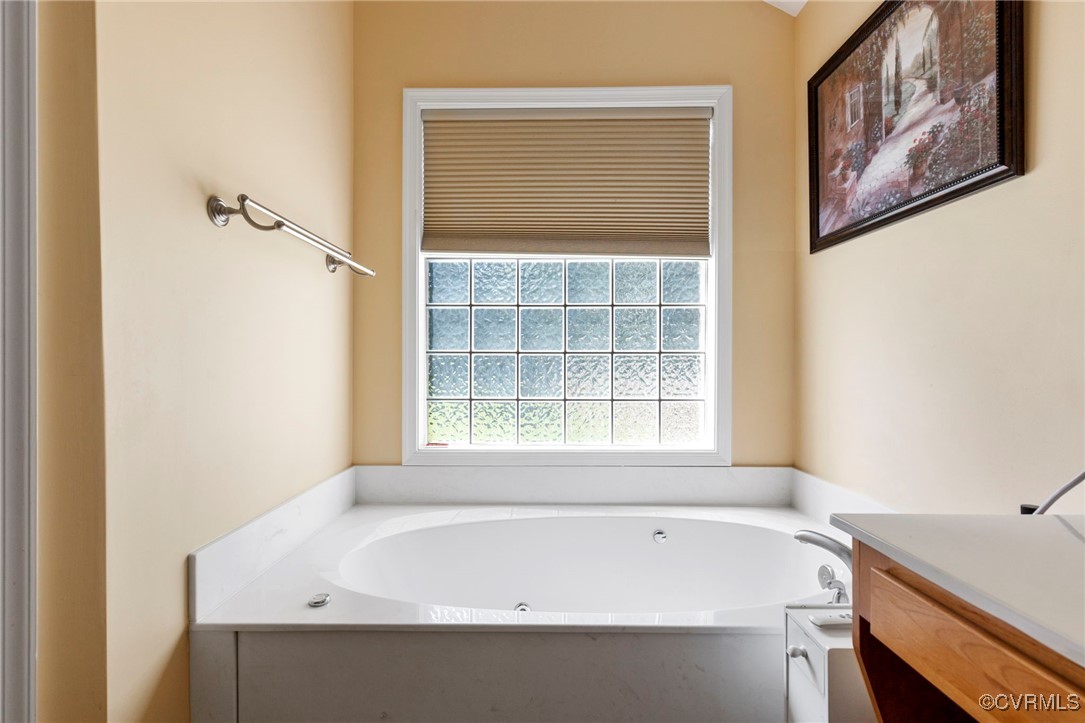 2901 Kingsdale Road North Chesterfield, VA 23237 - Photo 13 of 22 a bathroom with a tub and a window