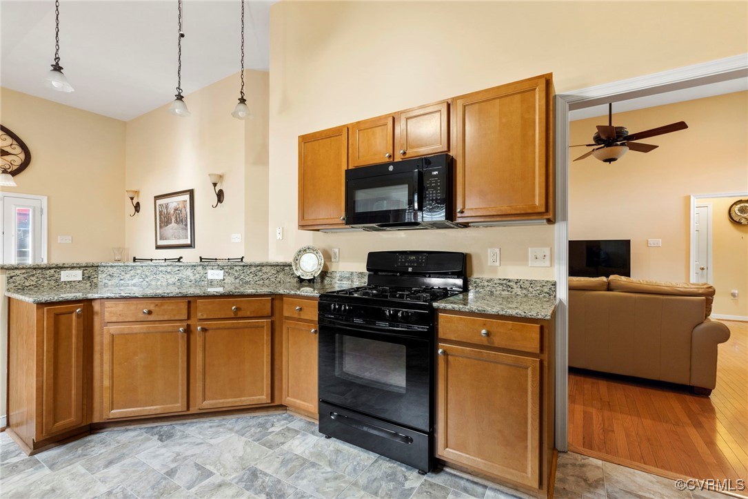 2901 Kingsdale Road North Chesterfield, VA 23237 - Photo 14 of 22 a kitchen with stainless steel appliances granite countertop a stove and a sink