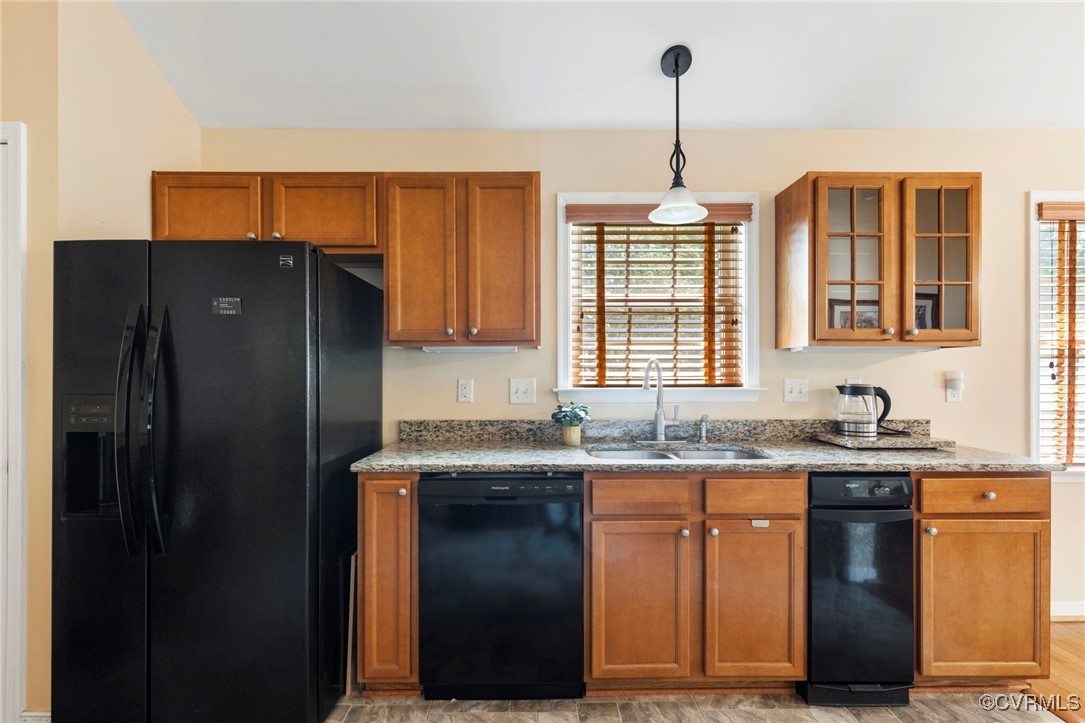 2901 Kingsdale Road North Chesterfield, VA 23237 - Photo 16 of 22 a kitchen with stainless steel appliances granite countertop a sink stove and refrigerator