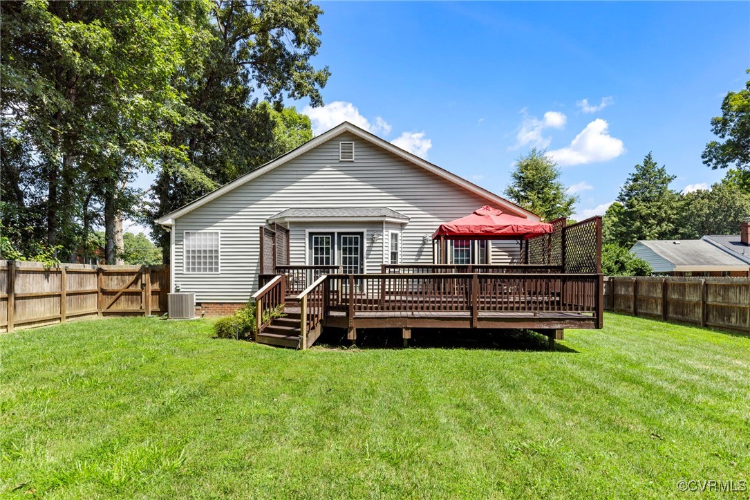 2901 Kingsdale Road North Chesterfield, VA 23237 - Photo 19 of 22 a front view of a house with a yard table and chairs