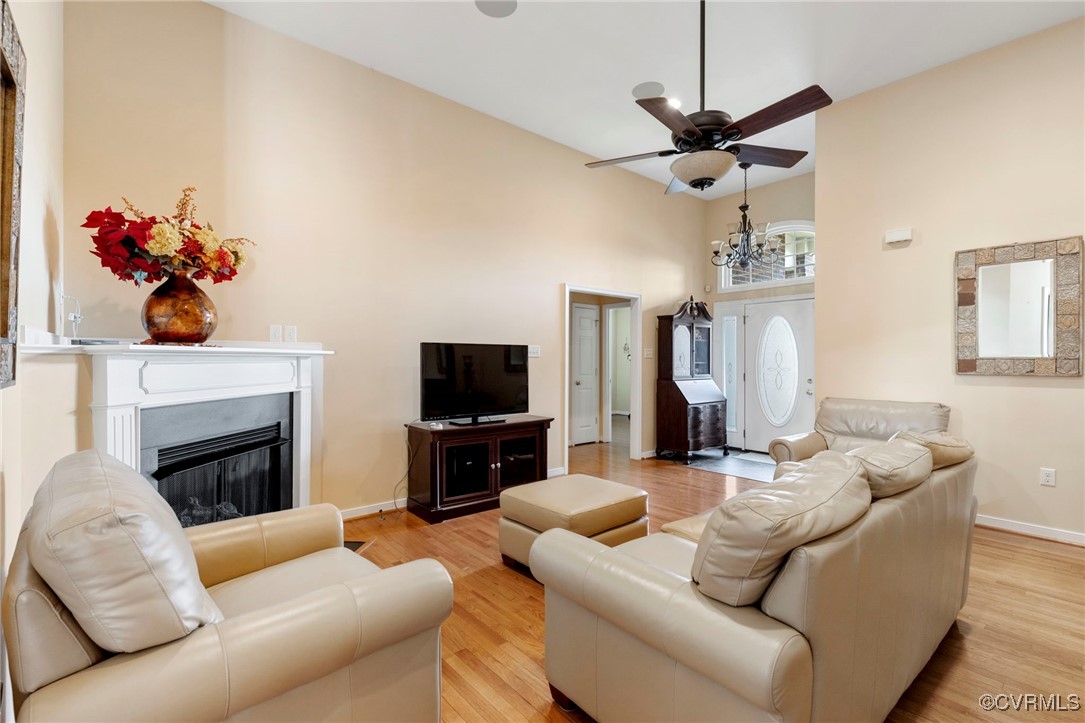 2901 Kingsdale Road North Chesterfield, VA 23237 - Photo 2 of 22 a living room with furniture fireplace and a flat screen tv