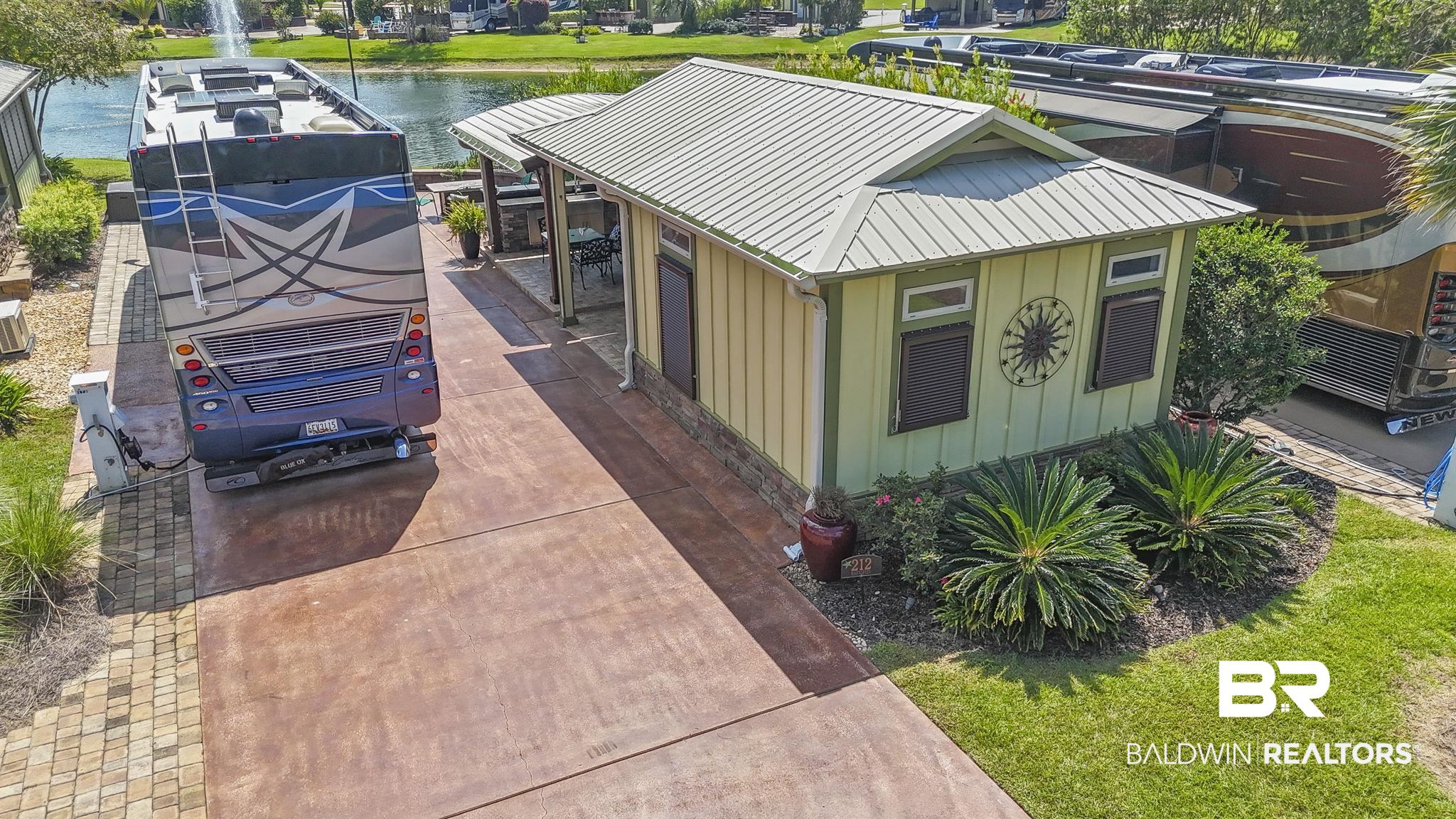 212 Magnifico Drive Foley, AL 36535 - Photo 2 of 50 Exterior space featuring a water view