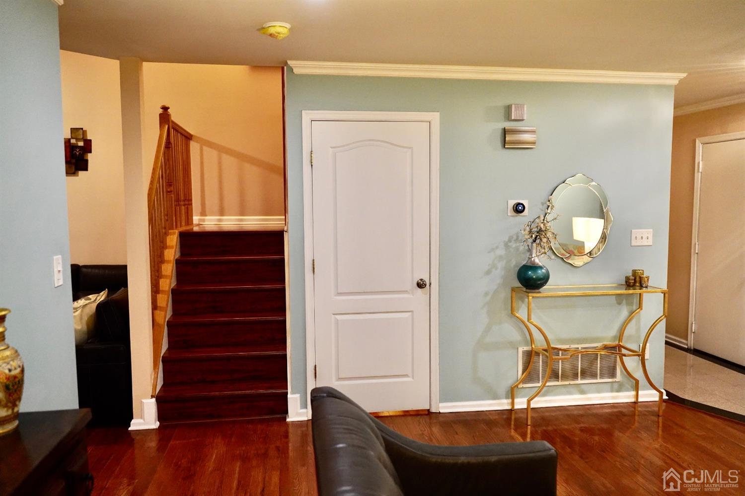 6 Hawthorne Road North Brunswick, NJ 08902 - Photo 1 of 3 a living room with wooden floor and furniture