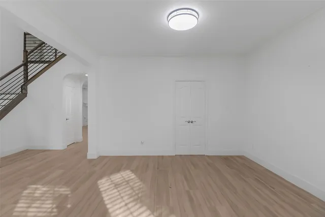 a bathroom with a sink a large mirror a shower and a bathtub