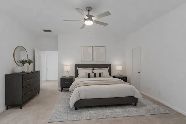 a view of a chandelier fan in a room