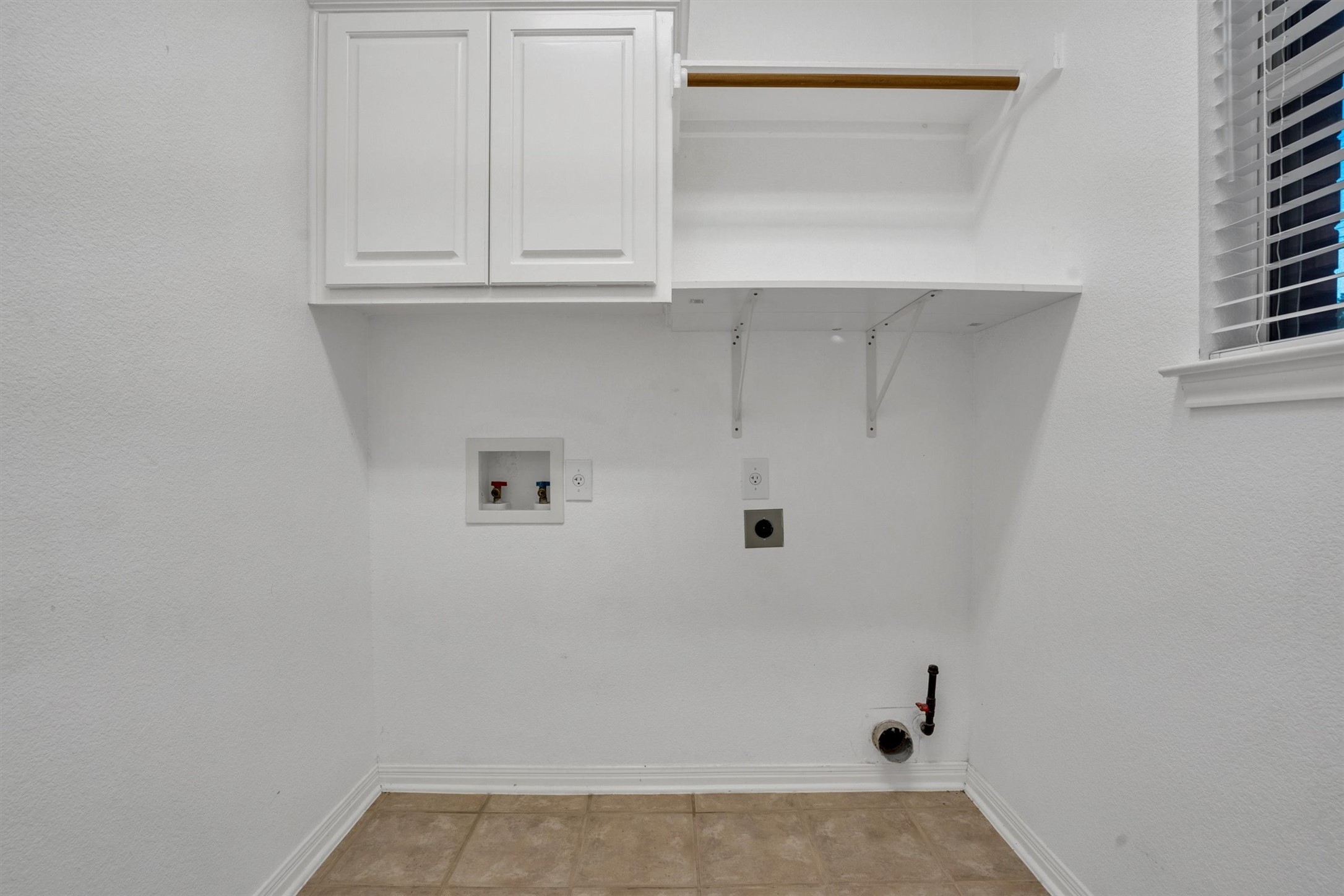 13013 Titus Court Austin, TX 78732 - Photo 26 of 30 a view of small space with empty racks on the wall