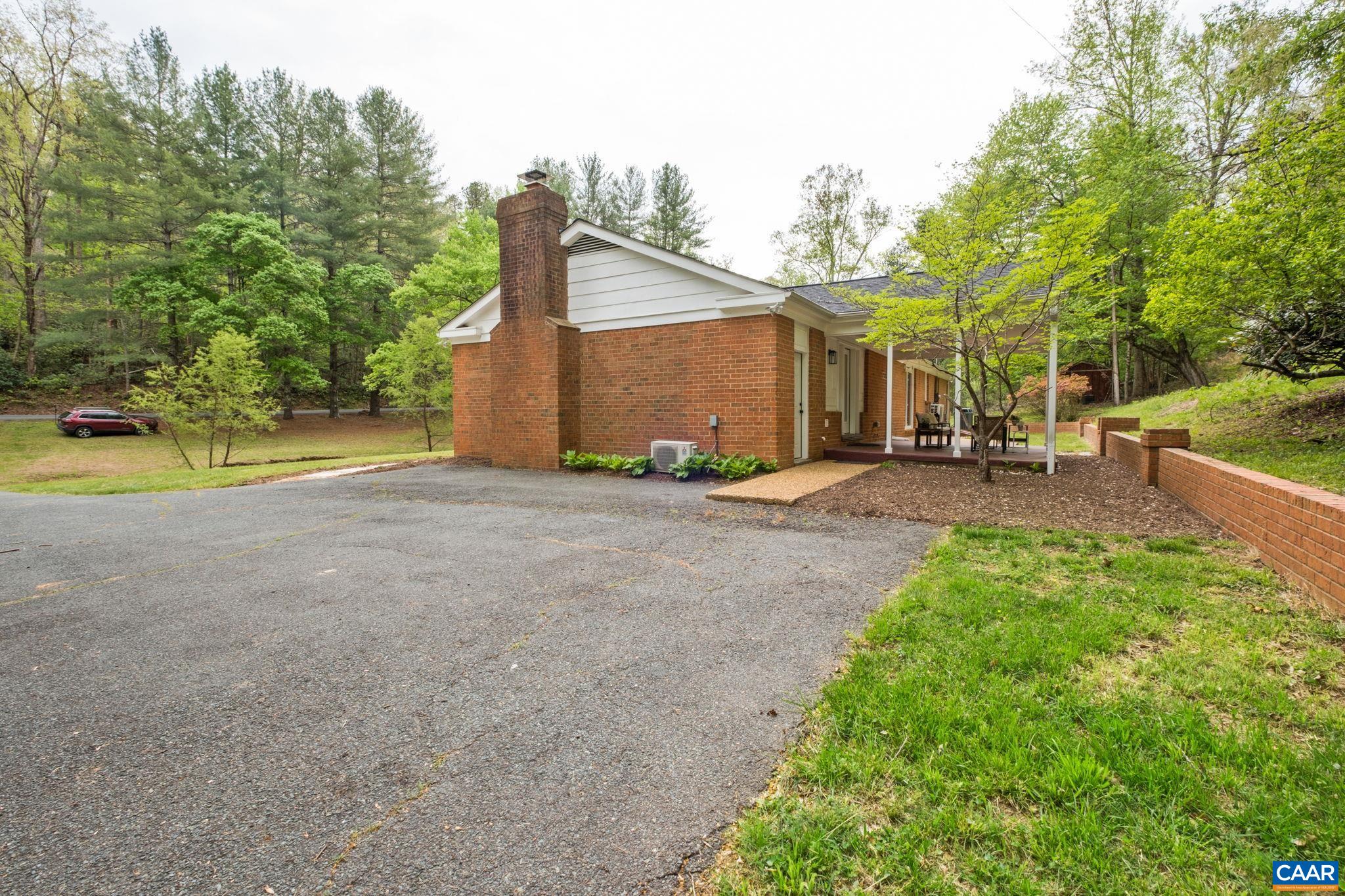 1680 Craigs Store Road Afton, VA 22920 - Photo 48 of 57 a view of a house with backyard and trees
