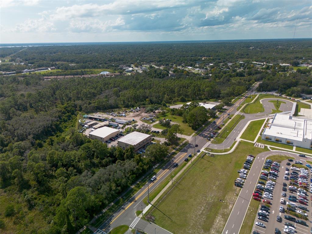 265 Enterprise Road Deltona, FL 32725 - Photo 14 of 18 an aerial view of a house with a ocean view